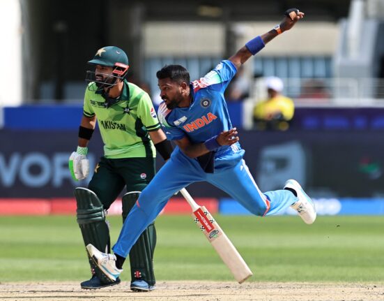 AFP 20250223 36YF7HT v2 HighRes TopshotCricketCt2025PakInd 1740306105